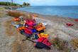 © GIORGOS - Lesvos Greece- Lifejackets left by refugees on the shore of Mytilini.
