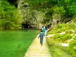© Goran - Tourists on walking trail at Plitvice Natural Park in Plitvice, Croatia.