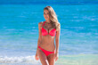 © yellowj - Young woman in red bikini