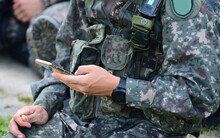 South Korean Army Soldier Using Smartphones.
