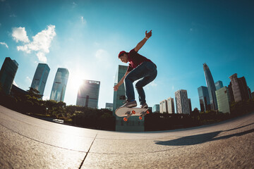 Wall Mural - Skateboarder skateboarding at sunrise park