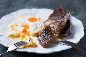 Wall Mural - rustic american australian steak and eggs breakfast