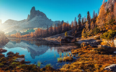 Fotobehang - Scenic image of Fairy-tale Landscape, over the Federa lake, Dolomites Alps. Best Popular places for Photographers. Wonderful Autumn Scenery during Sunset. Travel recreational outdoor activity concept.
