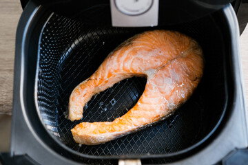 Salmon steak grilled on the air fryer