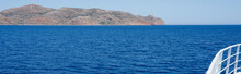 Rocky Coast Line Of Crete, Greece. View From The Ship. Copy Space.