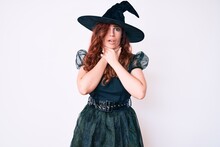 Young Beautiful Woman Wearing Witch Halloween Costume Shouting Suffocate Because Painful Strangle. Health Problem. Asphyxiate And Suicide Concept.