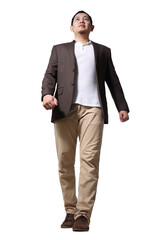 full length portrait of asian businessman wearing brown suit standing walking, front view low angle 
