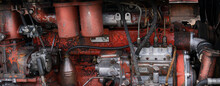 Old Diesel Tractor Engine Close-up Panorama, Red And Rusty