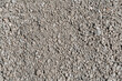 Small gray crushed stone crushed. Abstract background.