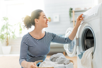 Wall Mural - woman is doing laundry