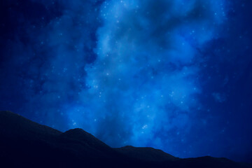 Wall Mural - photo of the night sky with the milky way and stars. the dark silhouette of the mountains. tourism.