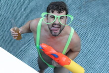 Man Wearing Hilarious Outfit At Pool Party  