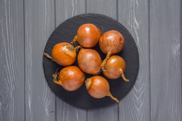 onions on a wooden background