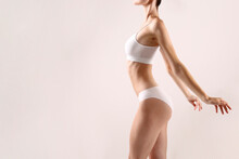 Cropped Image Of A Sporty Female In White Bra And Panties.