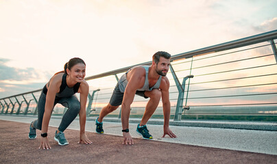 Couple doing sport on the street