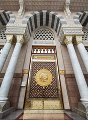 Wall Mural - MADINAH, SAUDI ARABIA - January 20, 2020 : View of entrance door to the Prophet Muhammad Mosque or An- Nabawi mosque in Madinah.