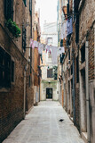 Fototapeta Uliczki - Traditional Venice Cityscape. Narrow street Venice, Italy.