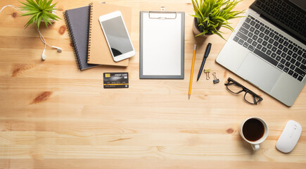Wall Mural - workplace of office desk wooden table with equipment other office supplies with copy space, flat lay
