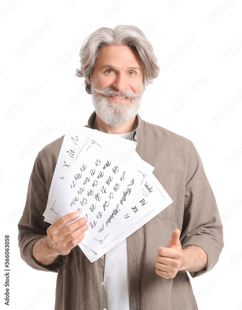 Senior male calligraphist on white background
