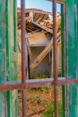 Sticker - Vertical shot of the ruins of an old building captured during the daytime