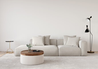 Living room in beige tones with a sofa, a floor lamp, a wooden table and a gold side table