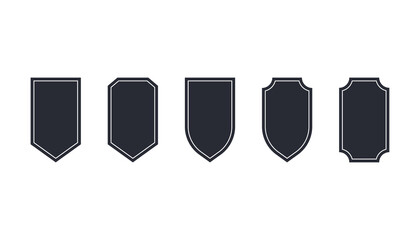 Wall Mural - Set of shield emblem in dark style. Protection badge label. Security shield silhouette. Defence badge in simple modern desing. Isolated heraldic sign. Medieval knight icon. Vector EPS 10.