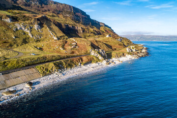 Wall Mural - The eastern coast of Northern Ireland and Causeway Coastal Route a.k.a Antrim Coast Road A2. One of the most scenic coastal roads in Europe. Aerial view in winter