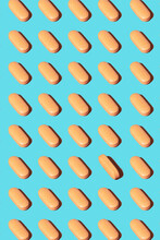 Yellow Pills On Cyan Background. Pattern