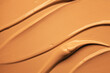 Texture of smudge cosmetic cream foundation liquid background