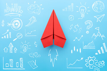 Wall Mural - Business success, Innovation and solution concept, Red paper plane and hand drawn business strategy on blue background