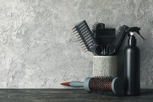 Composition With Hairdresser Accessories On Wooden Table, Space For Text