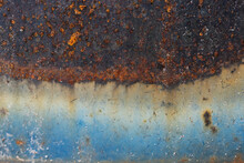 Old Rust Metal Surface. Abstract Grunge Background. Corrosion Of Metal. Blue And Brown Background With Scratches And Cracks