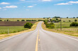 © Fang zheng - Summer or spring view of country road in Justin Texas