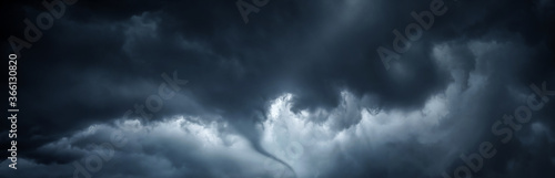 Fotomural The typhoon is born, a tornado in a stormy dark sky with black clouds