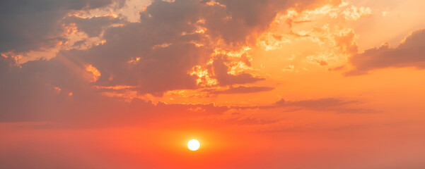 Wall Mural - beautiful colorful sunset sky with orange clouds. nature sky background.