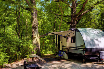 travel trailer camping in the woods at starved rock state park illinois