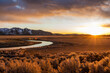 © Steve Smith/Tetra Images - USA, Idaho, Picabo, Sunset over plain and mountain range