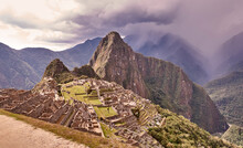 Peru, Machu Pichu, Mountain Range And Ruins Of Aztec Village