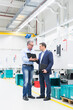 © Westend61 - Two businessmen having a discussion in a factory