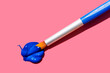 © Westend61 - Studio shot of paintbrush with blue oil paint