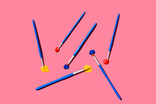 Paintbrushes With Blue, Red And Yellow Oil Paint