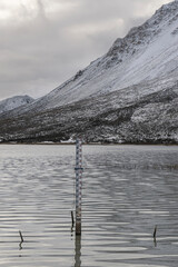 Wall Mural - Mountain lake during winter season at sunset in Patagonia