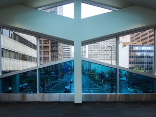 Wall Mural - city seen from a window over the street with tinted glass and symmetrical shape