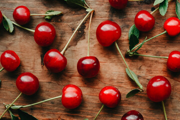 Ripe cherries on a wooden windowsill. Cottagecore Aesthetics. Rustic, vintage style Juicy summer concept