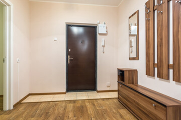 doors in modern entrance hall of corridor in expensive apartments