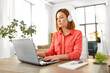 © Syda Productions - remote job, technology and people concept - young woman in headphones with laptop computer working at home office