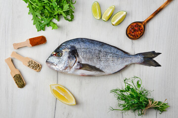 Wall Mural - Dorada fish on the table