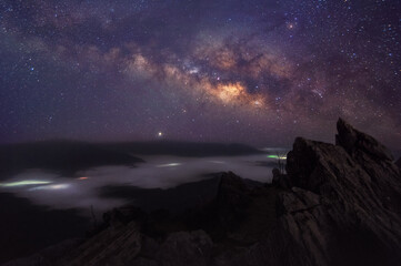 Wall Mural - milky way galaxy and mountain landscape.