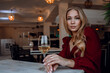 © Olena_Molchanova - woman with glass of white wine in cafe or restaurant. sexy young blonde girl