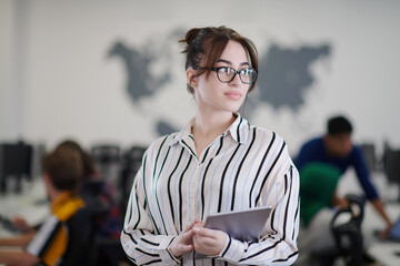 Wall Mural - portrait of businesswoman holding tablet computer